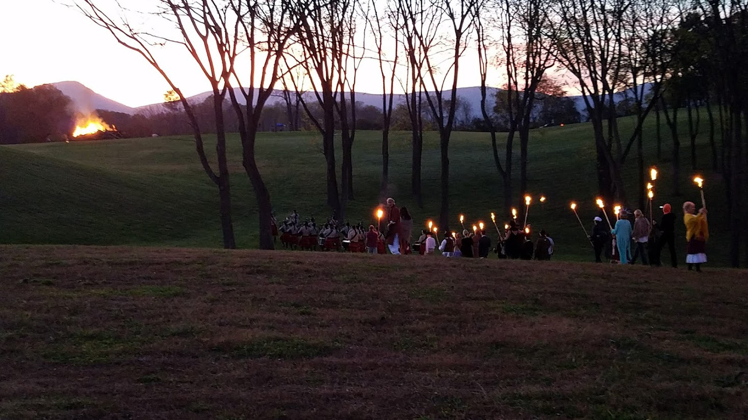torchlight procession of pipers to the bonfire