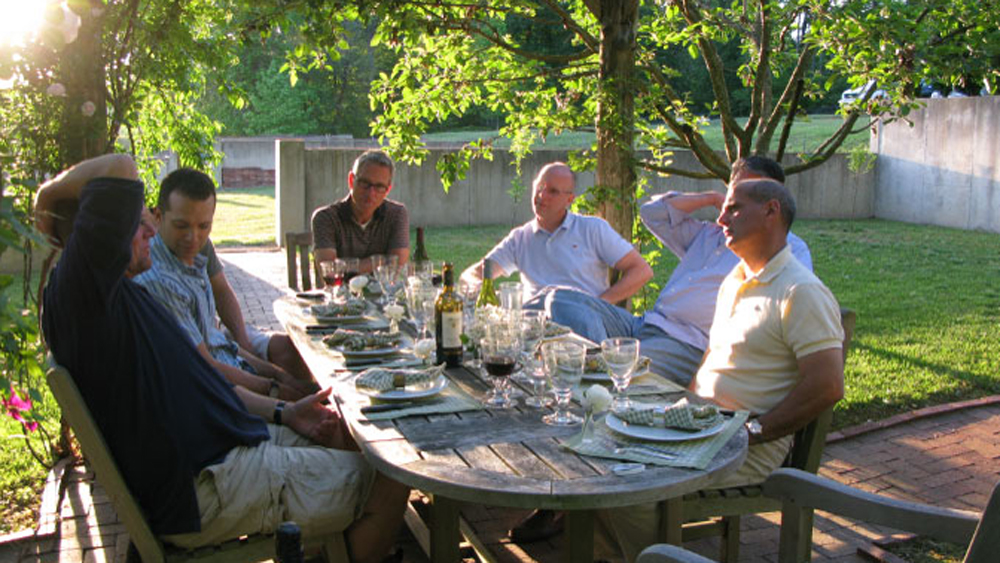 guests enjoying alfresco dinner