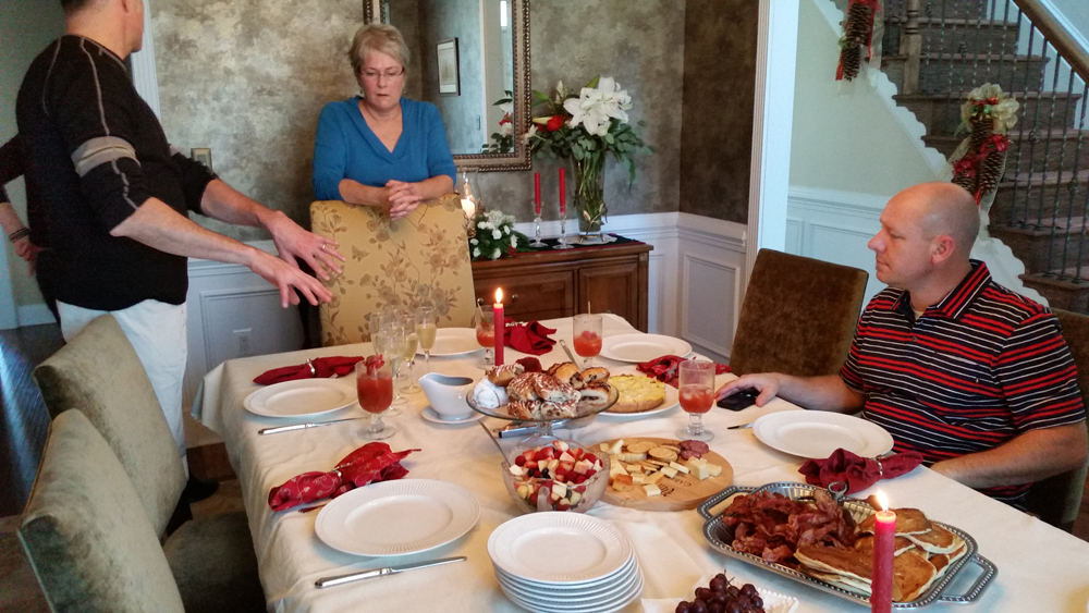 Keith tells his sister Barbara how to serve Christmas brunch