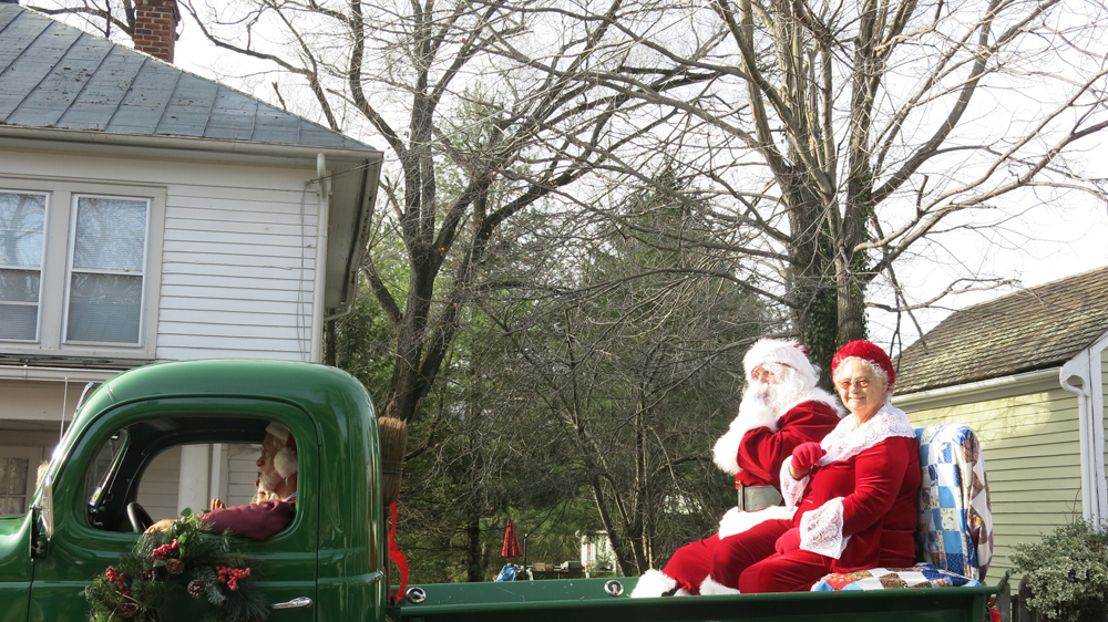 Santa and Mrs Claus end the parade